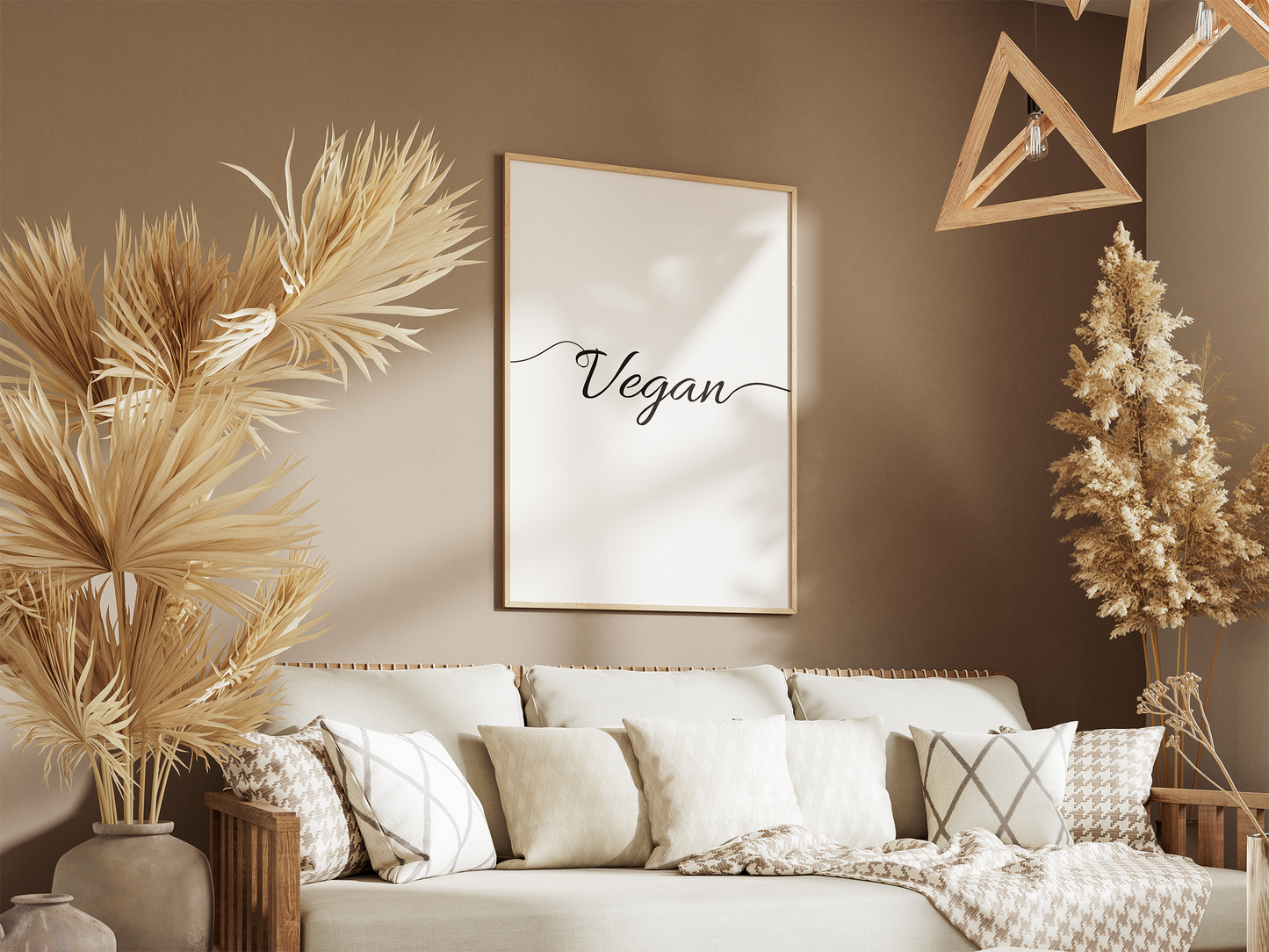 Printable digital art piece in a minimalist frame, with the word 'Vegan' in flowing cursive, complementing a cozy earth-toned living space.