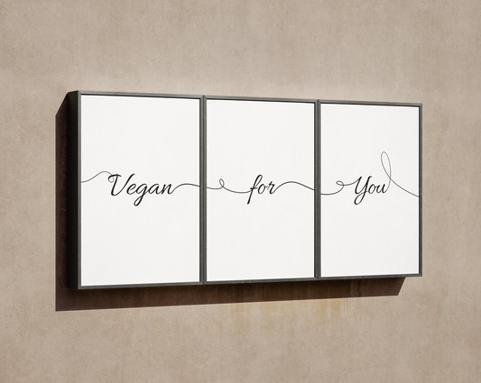 Triptych of printable digital paintings forming the phrase 'Vegan for You' displayed on a smooth, contemporary wall.